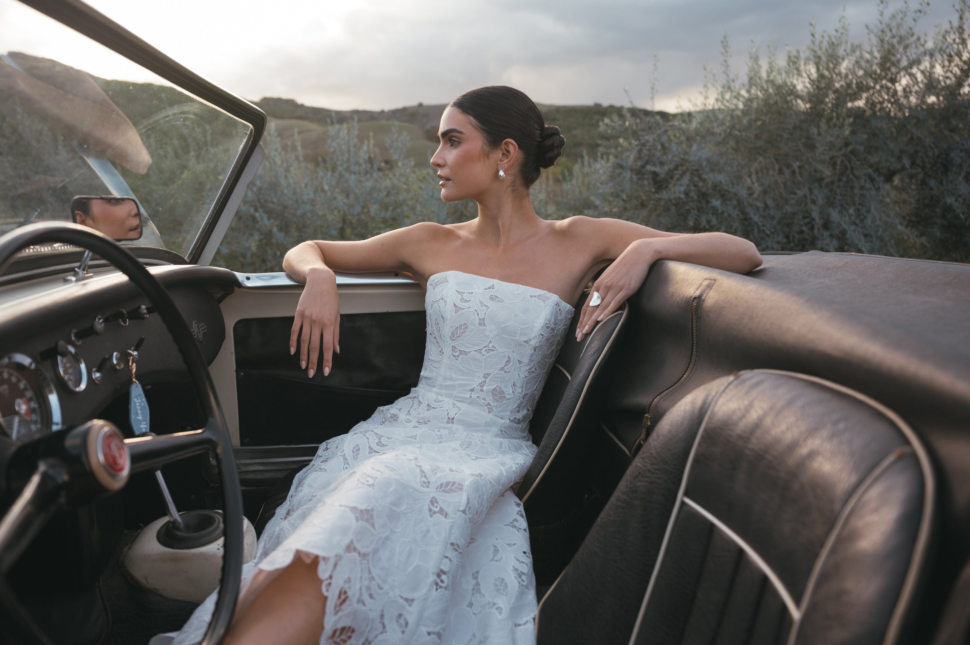 Bride in a white mini dress