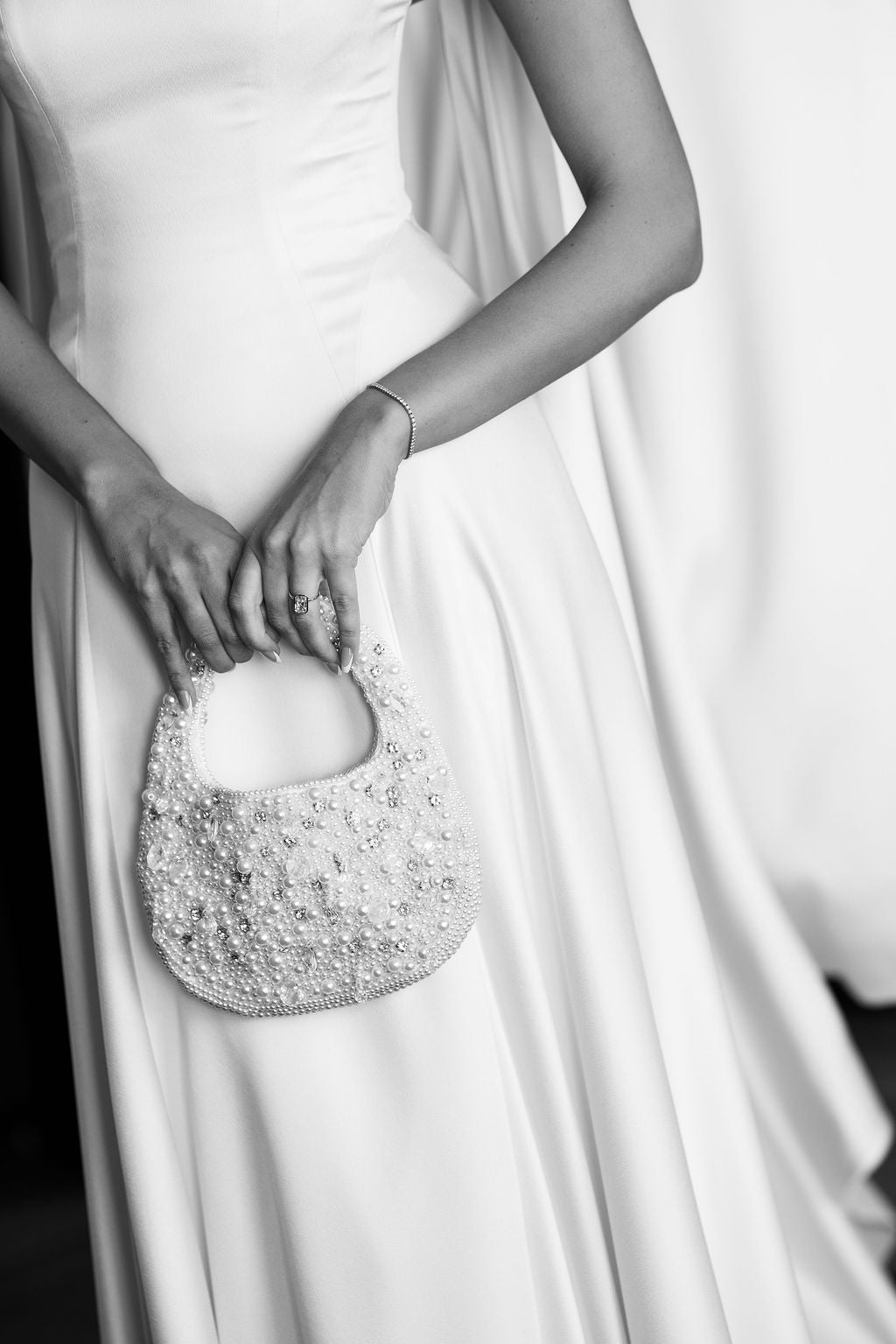Real Bride Paige Mobley in the Subtle Drop Waist Addilyn Fit and and Flare Bridal Gown.