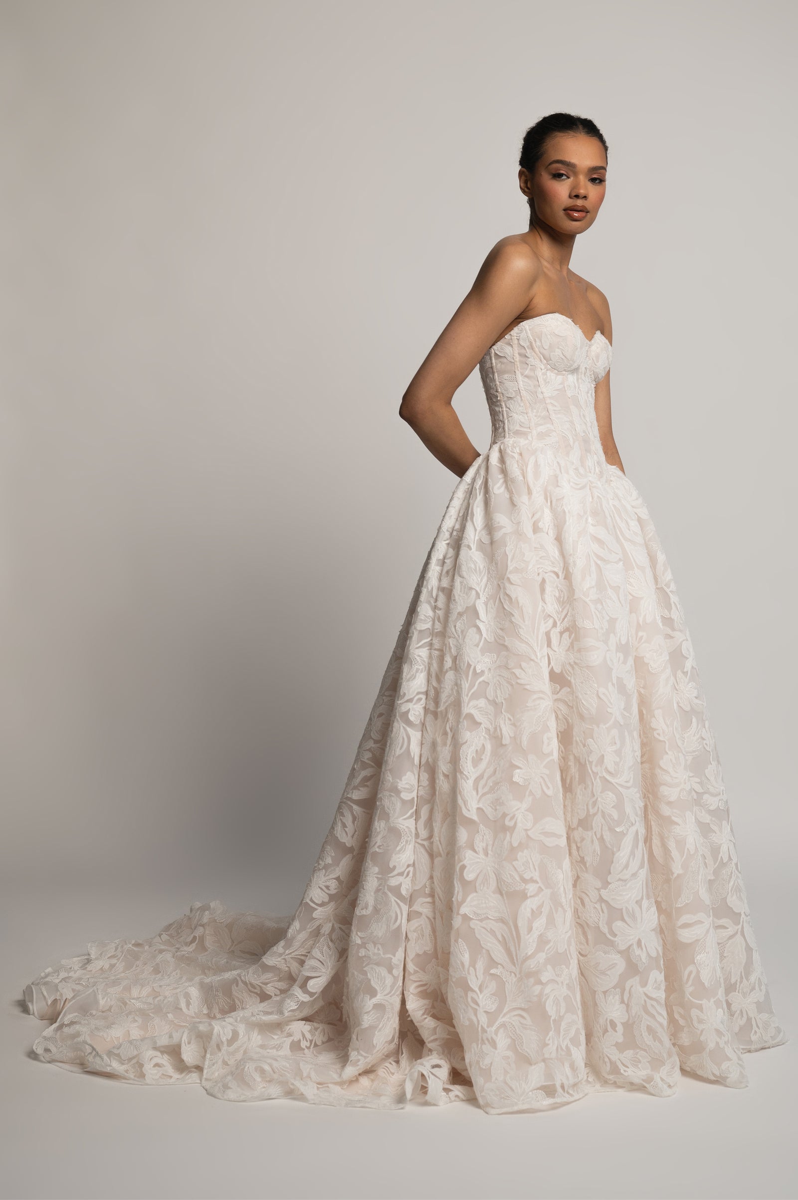 Amelie drop waist floral A-line wedding dress on model.