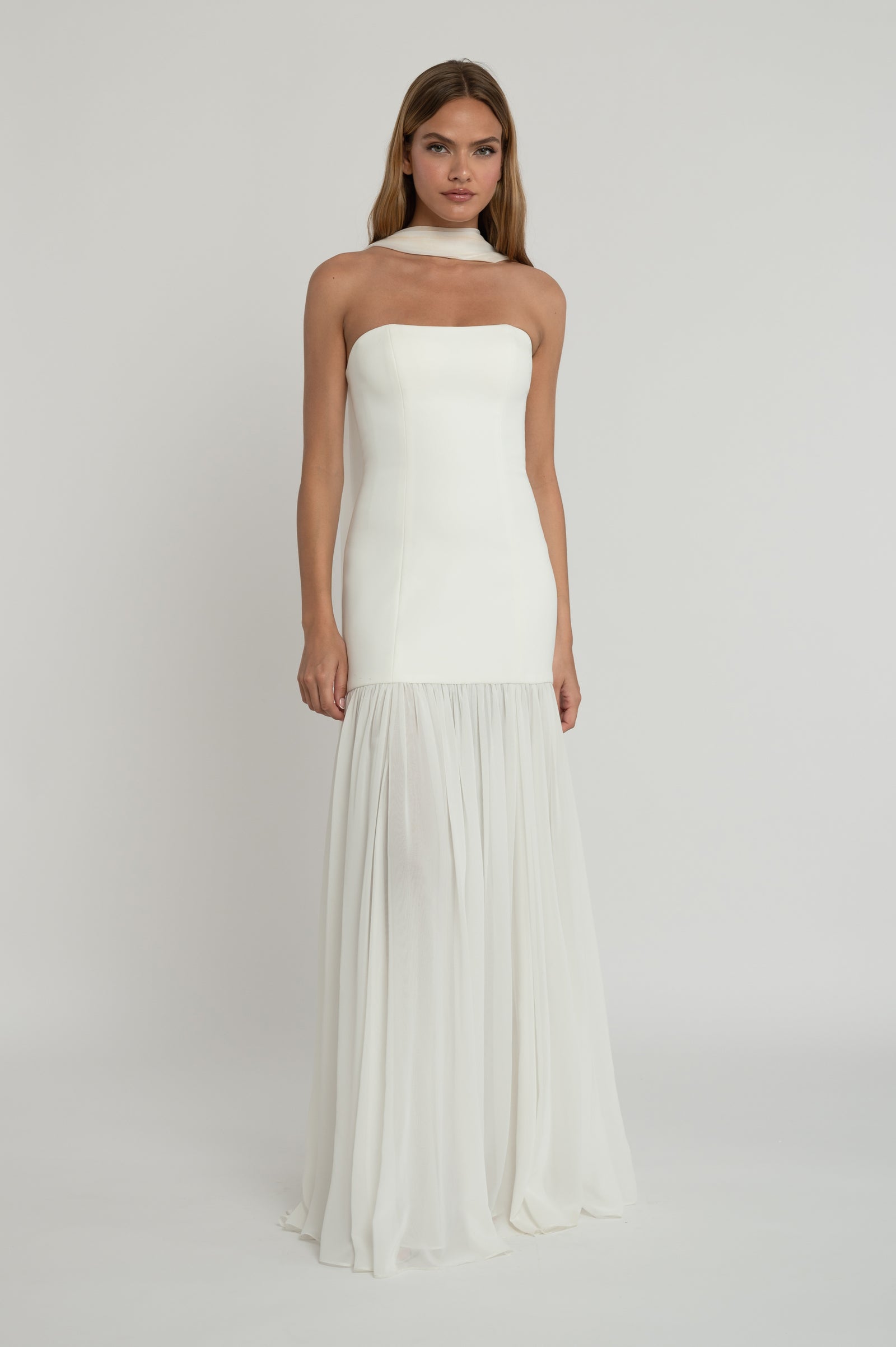Strapless crepe and chiffon drop waist bridal dress.