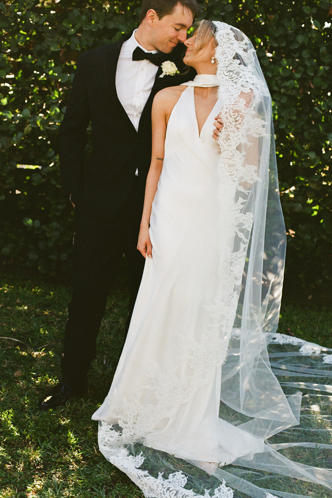  Real Bride Bethany in the Sleek Satin V Neck, Fit and Flare Jennifer Slip Bridal Gown