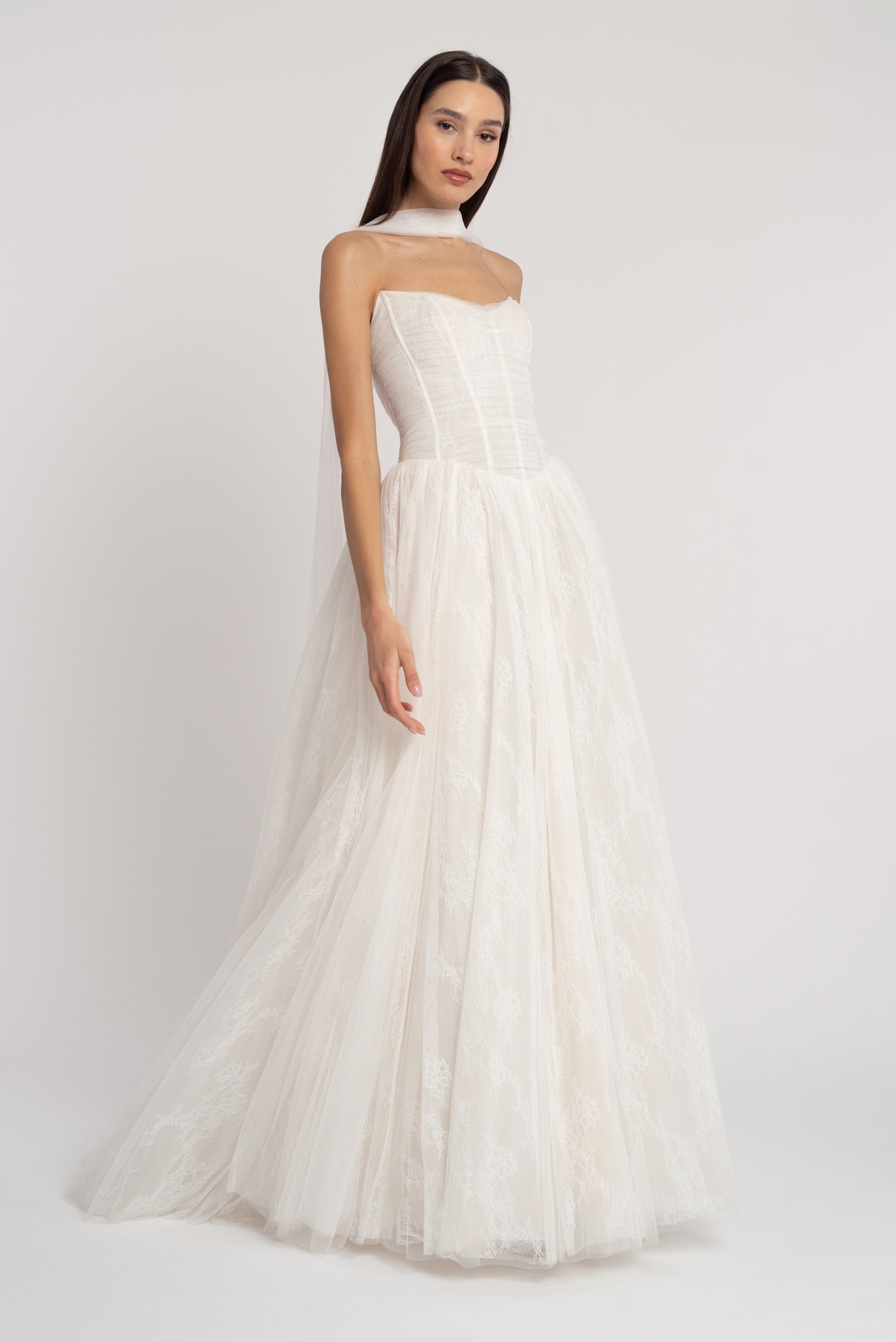 Floral tulle strapless wedding dress with dropped waist.