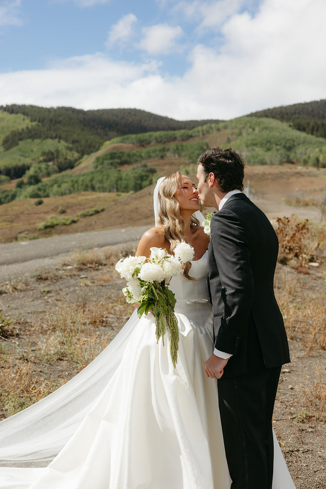 Basque Waist Danielle Bridal Gown on Bride Bekah