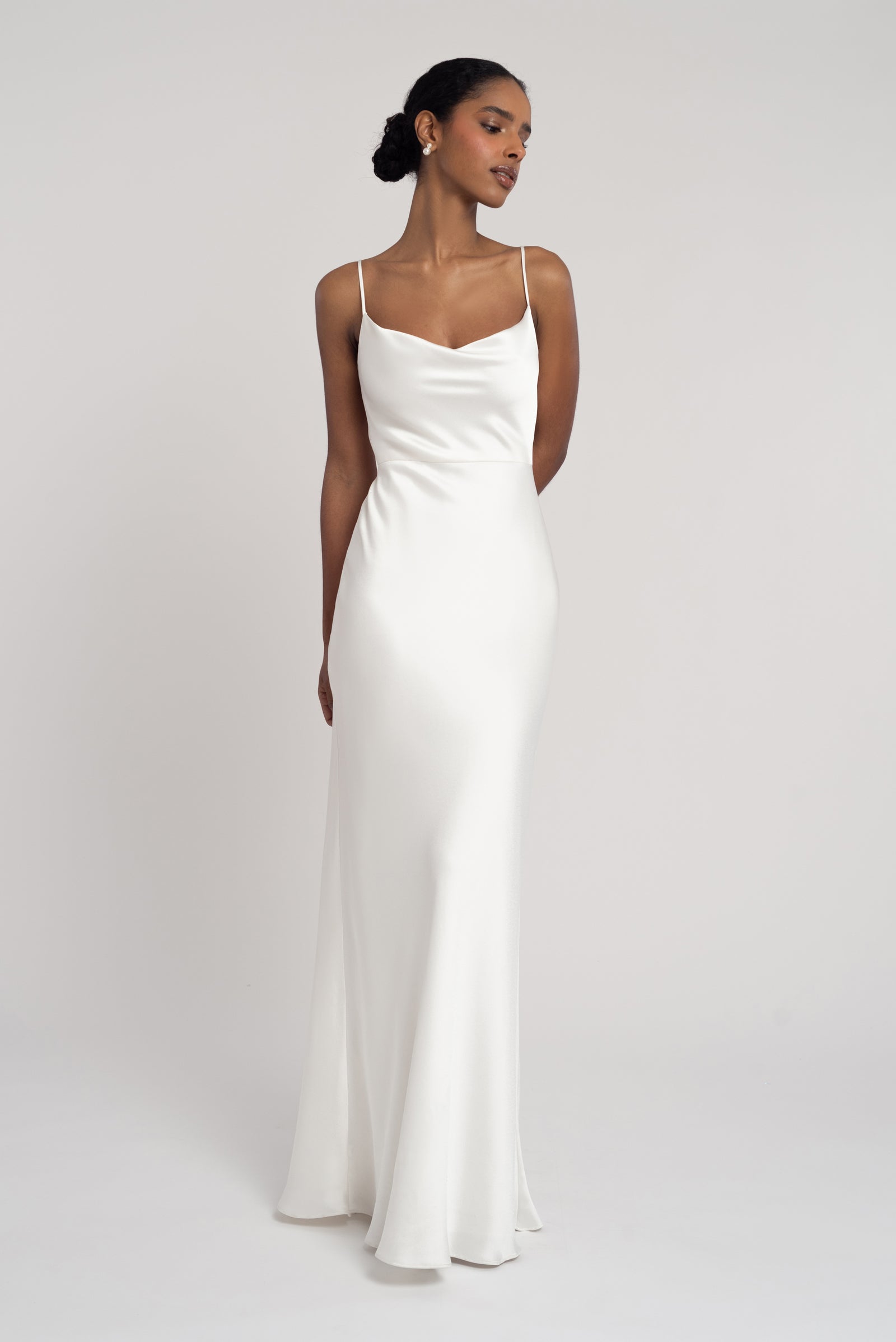 Simple satin bridal gown with cowl neck and easy slip skirt.